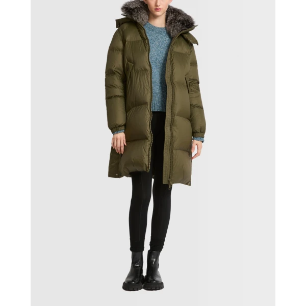Woman wearing Yves Salomon shearling fur coat – luxury outerwear at Luxury Shoes 