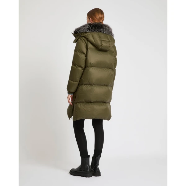 Woman wearing Yves Salomon shearling fur coat – luxury outerwear at Luxury Shoes 