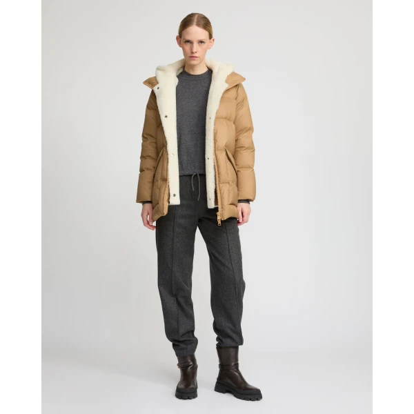Woman wearing Yves Salomon shearling fur coat – luxury outerwear at Luxury Shoes 
