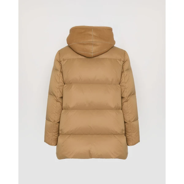 Woman wearing Yves Salomon shearling fur coat – luxury outerwear at Luxury Shoes 