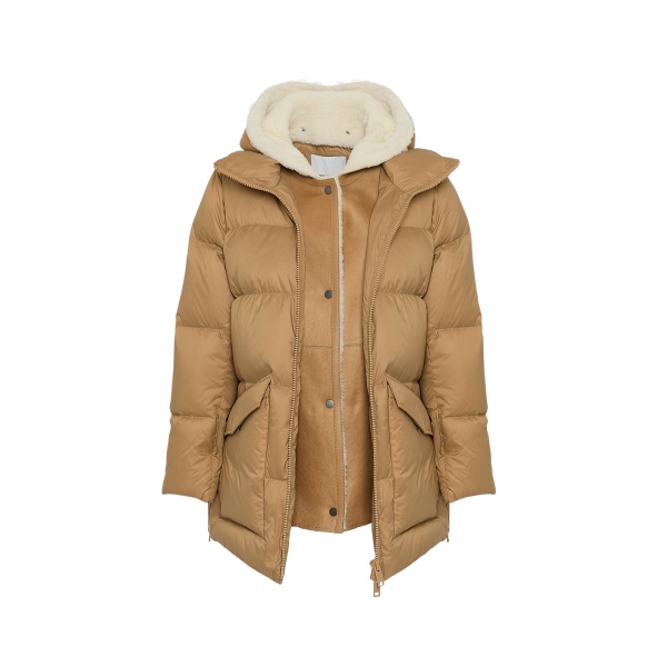 Woman wearing Yves Salomon shearling fur coat – luxury outerwear at Luxury Shoes 