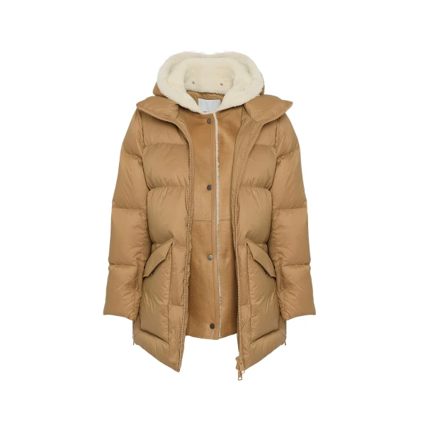 Woman wearing Yves Salomon shearling fur coat – luxury outerwear at Luxury Shoes 