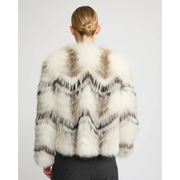 Woman wearing Yves Salomon shearling fur coat – luxury outerwear at Luxury Shoes 