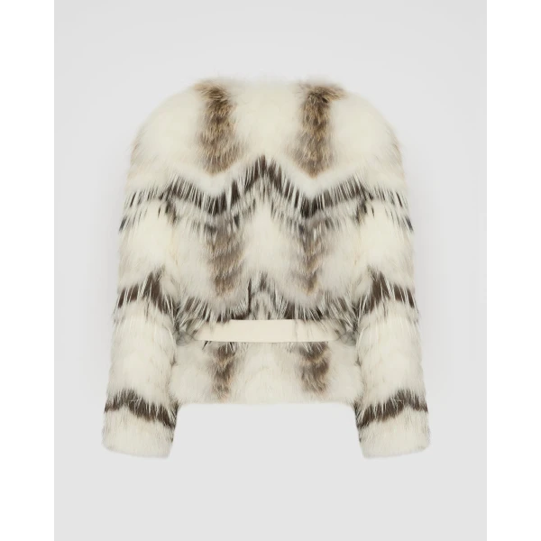 Woman wearing Yves Salomon shearling fur coat – luxury outerwear at Luxury Shoes 