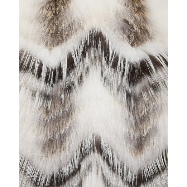 Woman wearing Yves Salomon shearling fur coat – luxury outerwear at Luxury Shoes 