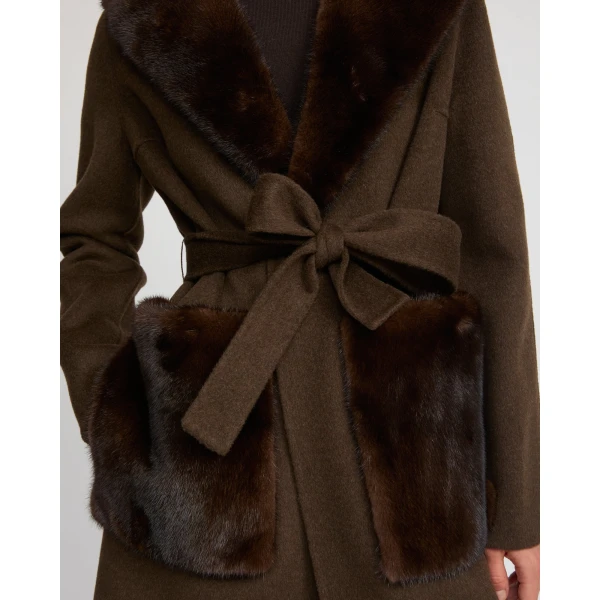 Woman wearing Yves Salomon shearling fur coat – luxury outerwear at Luxury Shoes 