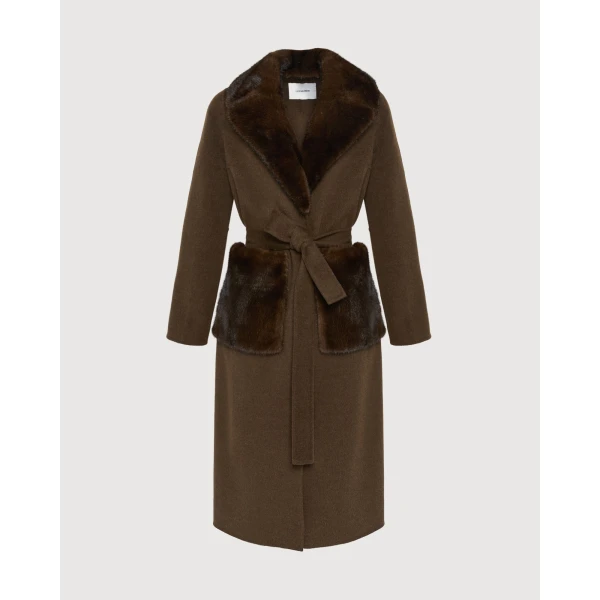 Woman wearing Yves Salomon shearling fur coat – luxury outerwear at Luxury Shoes 