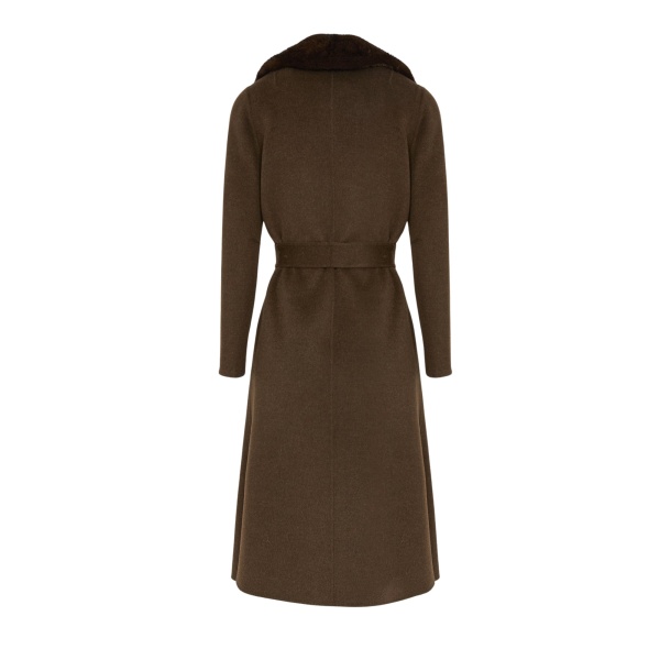 Woman wearing Yves Salomon shearling fur coat – luxury outerwear at Luxury Shoes 