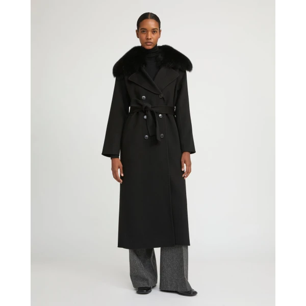 Woman wearing Yves Salomon shearling fur coat – luxury outerwear at Luxury Shoes 