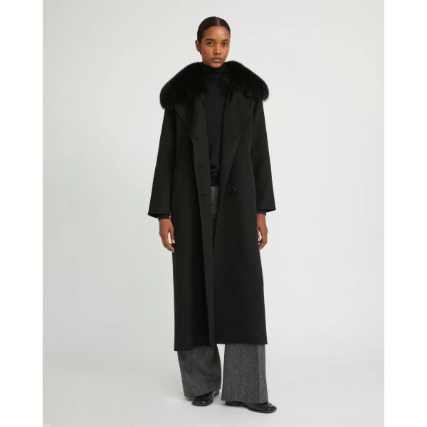 Woman wearing Yves Salomon shearling fur coat – luxury outerwear at Luxury Shoes 