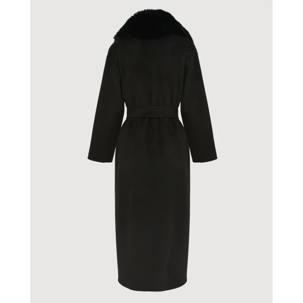 Woman wearing Yves Salomon shearling fur coat – luxury outerwear at Luxury Shoes 