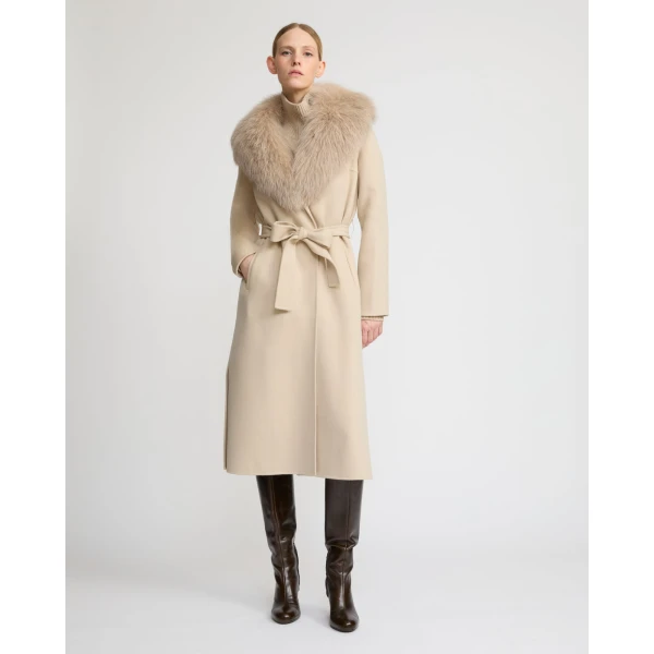 Woman wearing Yves Salomon shearling fur coat – luxury outerwear at Luxury Shoes 
