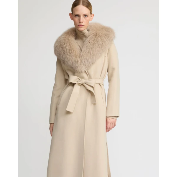 Woman wearing Yves Salomon shearling fur coat – luxury outerwear at Luxury Shoes 