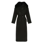 Woman wearing Yves Salomon shearling fur coat – luxury outerwear at Luxury Shoes 