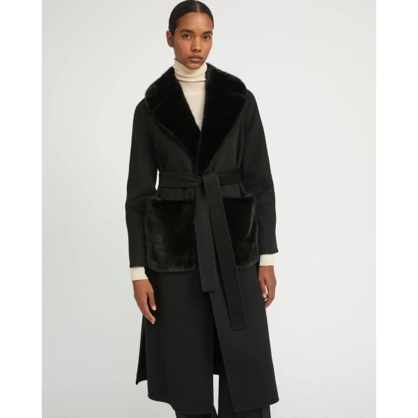 Woman wearing Yves Salomon shearling fur coat – luxury outerwear at Luxury Shoes 