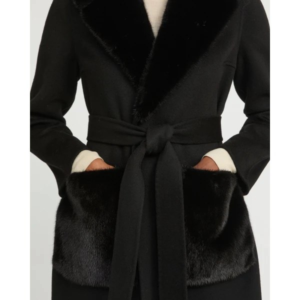 Woman wearing Yves Salomon shearling fur coat – luxury outerwear at Luxury Shoes 