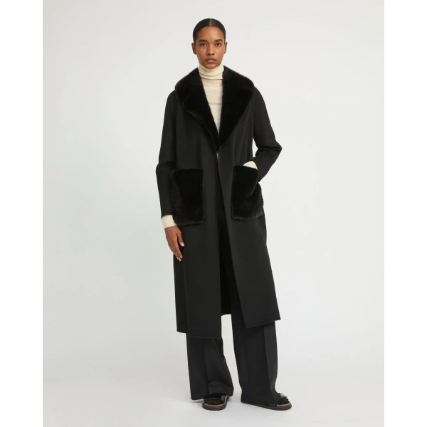 Woman wearing Yves Salomon shearling fur coat – luxury outerwear at Luxury Shoes 