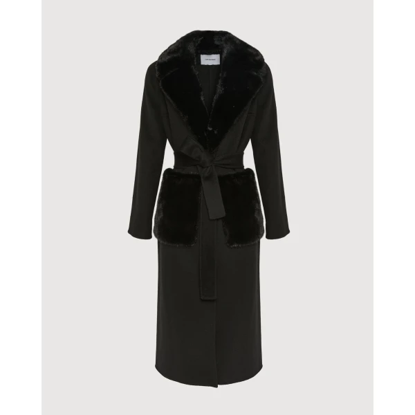 Woman wearing Yves Salomon shearling fur coat – luxury outerwear at Luxury Shoes 