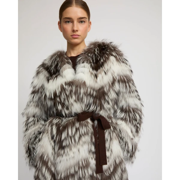 Woman wearing Yves Salomon shearling fur coat – luxury outerwear at Luxury Shoes 
