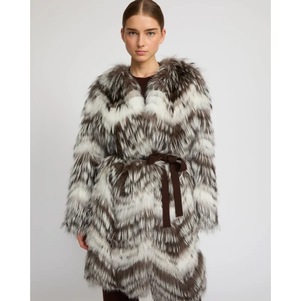 Woman wearing Yves Salomon shearling fur coat – luxury outerwear at Luxury Shoes 