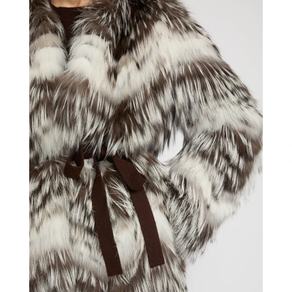 Woman wearing Yves Salomon shearling fur coat – luxury outerwear at Luxury Shoes 