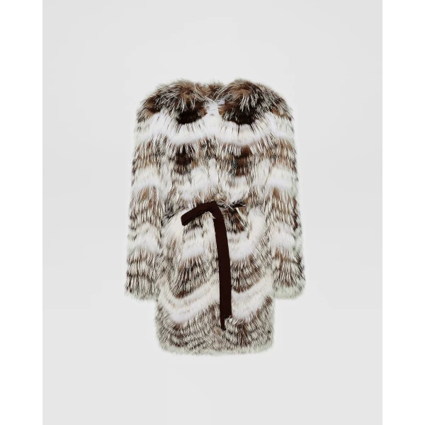 Woman wearing Yves Salomon shearling fur coat – luxury outerwear at Luxury Shoes 