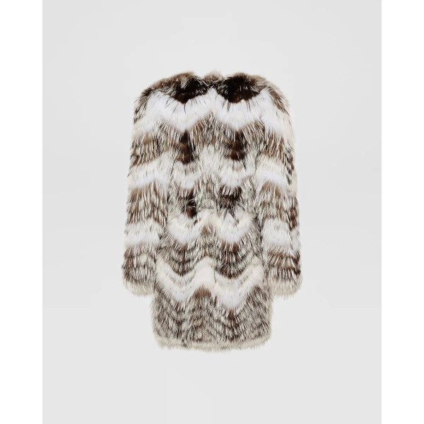 Woman wearing Yves Salomon shearling fur coat – luxury outerwear at Luxury Shoes 