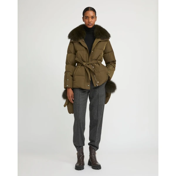 Woman wearing Yves Salomon shearling fur coat – luxury outerwear at Luxury Shoes 