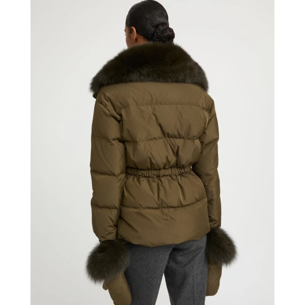 Woman wearing Yves Salomon shearling fur coat – luxury outerwear at Luxury Shoes 