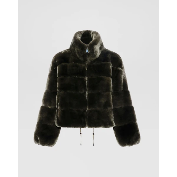 Woman wearing Yves Salomon shearling fur coat – luxury outerwear at Luxury Shoes 