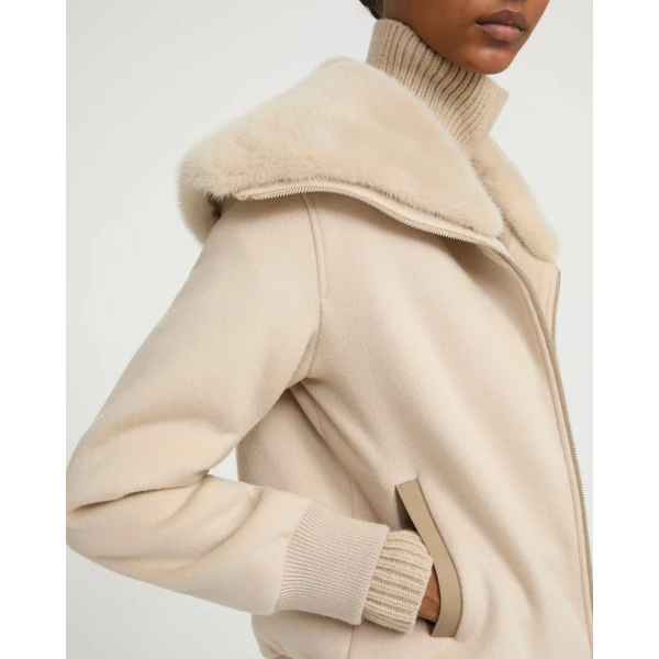 Woman wearing Yves Salomon shearling fur coat – luxury outerwear at Luxury Shoes 