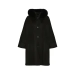 Woman wearing Yves Salomon shearling fur coat – luxury outerwear at Luxury Shoes 
