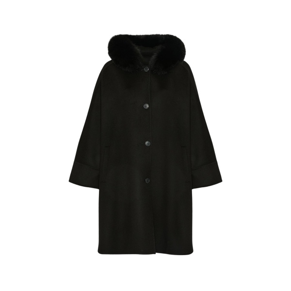 Woman wearing Yves Salomon shearling fur coat – luxury outerwear at Luxury Shoes 