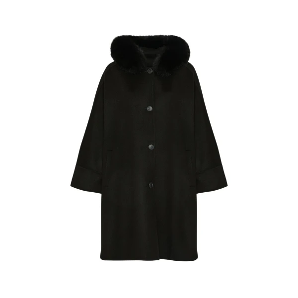 Woman wearing Yves Salomon shearling fur coat – luxury outerwear at Luxury Shoes 