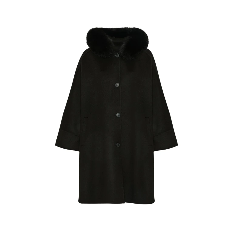 Woman wearing Yves Salomon shearling fur coat – luxury outerwear at Luxury Shoes 