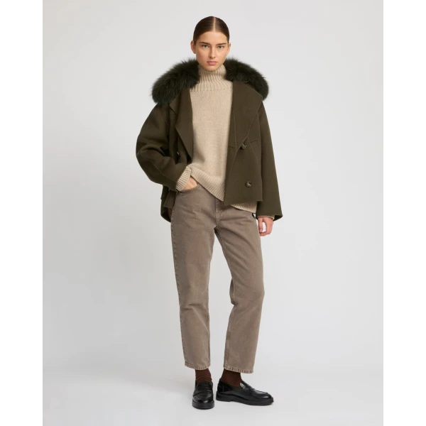 Woman wearing Yves Salomon shearling fur coat – luxury outerwear at Luxury Shoes 