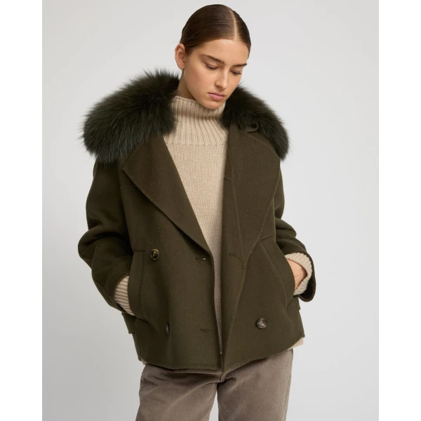 Woman wearing Yves Salomon shearling fur coat – luxury outerwear at Luxury Shoes 