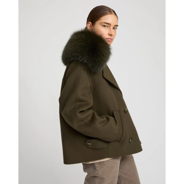 Woman wearing Yves Salomon shearling fur coat – luxury outerwear at Luxury Shoes 