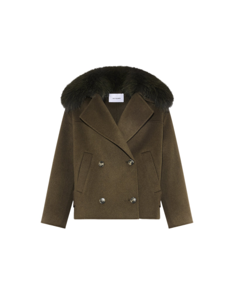 Woman wearing Yves Salomon shearling fur coat – luxury outerwear at Luxury Shoes 