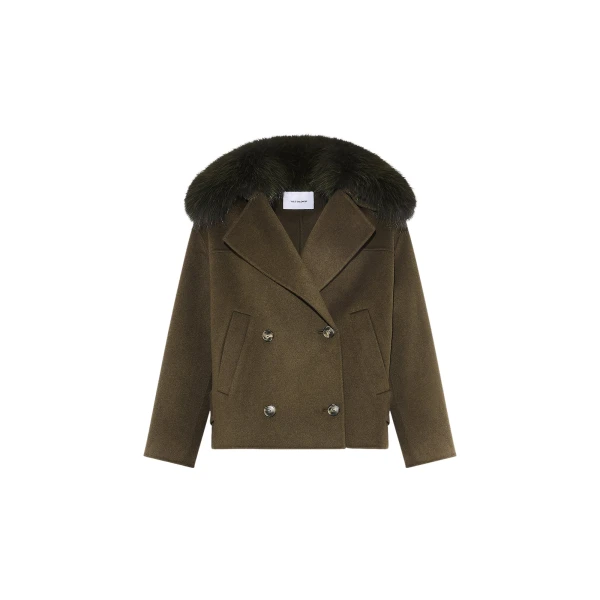 Woman wearing Yves Salomon shearling fur coat – luxury outerwear at Luxury Shoes 