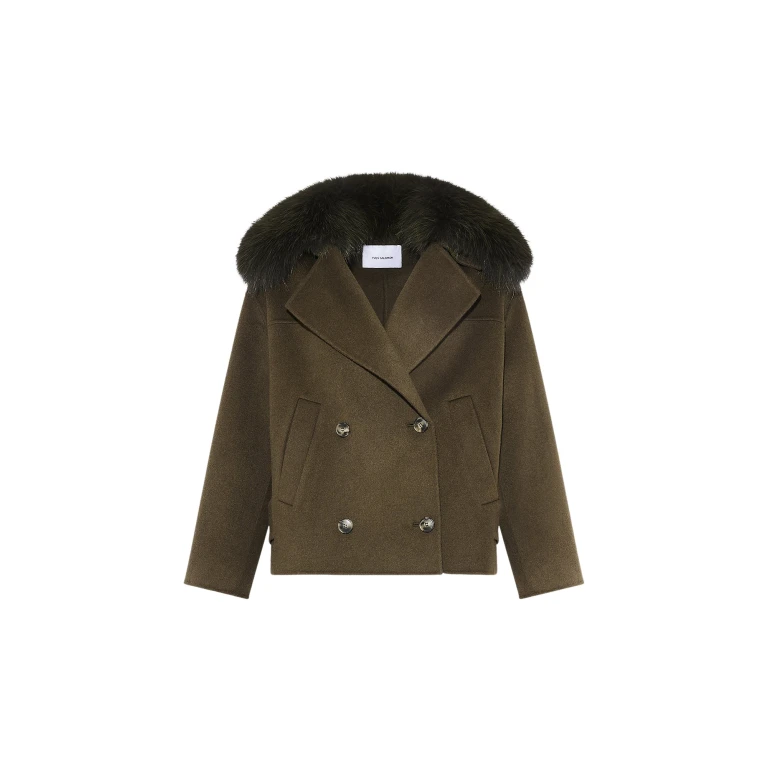 Woman wearing Yves Salomon shearling fur coat – luxury outerwear at Luxury Shoes 