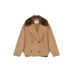 Woman wearing Yves Salomon shearling fur coat – luxury outerwear at Luxury Shoes 