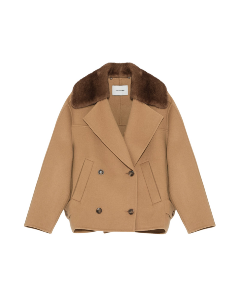 Woman wearing Yves Salomon shearling fur coat – luxury outerwear at Luxury Shoes 
