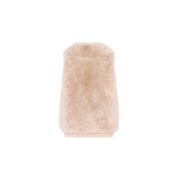 Woman wearing Yves Salomon shearling fur coat – luxury outerwear at Luxury Shoes 