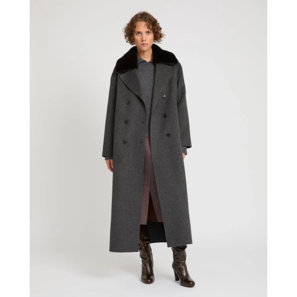 Woman wearing Yves Salomon shearling fur coat – luxury outerwear at Luxury Shoes 
