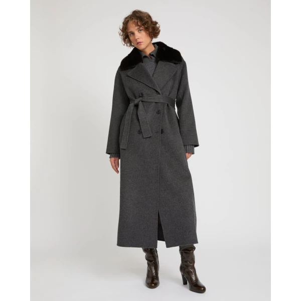 Woman wearing Yves Salomon shearling fur coat – luxury outerwear at Luxury Shoes 