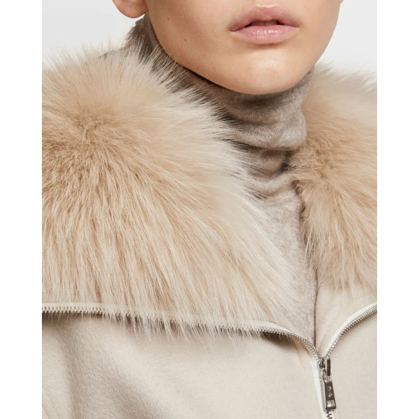 Woman wearing Yves Salomon shearling fur coat – luxury outerwear at Luxury Shoes 