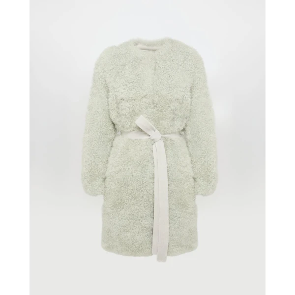 Woman wearing Yves Salomon shearling fur coat – luxury outerwear at Luxury Shoes 