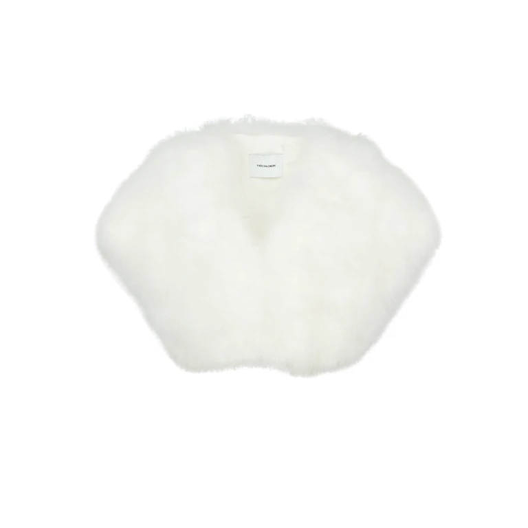 Woman wearing Yves Salomon shearling fur coat – luxury outerwear at Luxury Shoes 