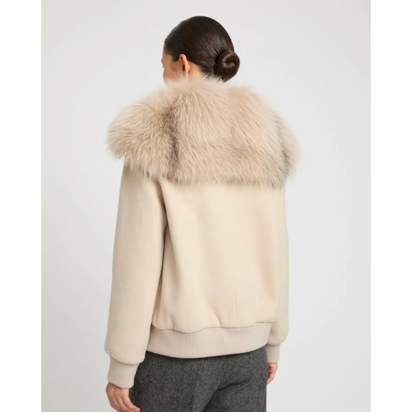 Woman wearing Yves Salomon shearling fur coat – luxury outerwear at Luxury Shoes 